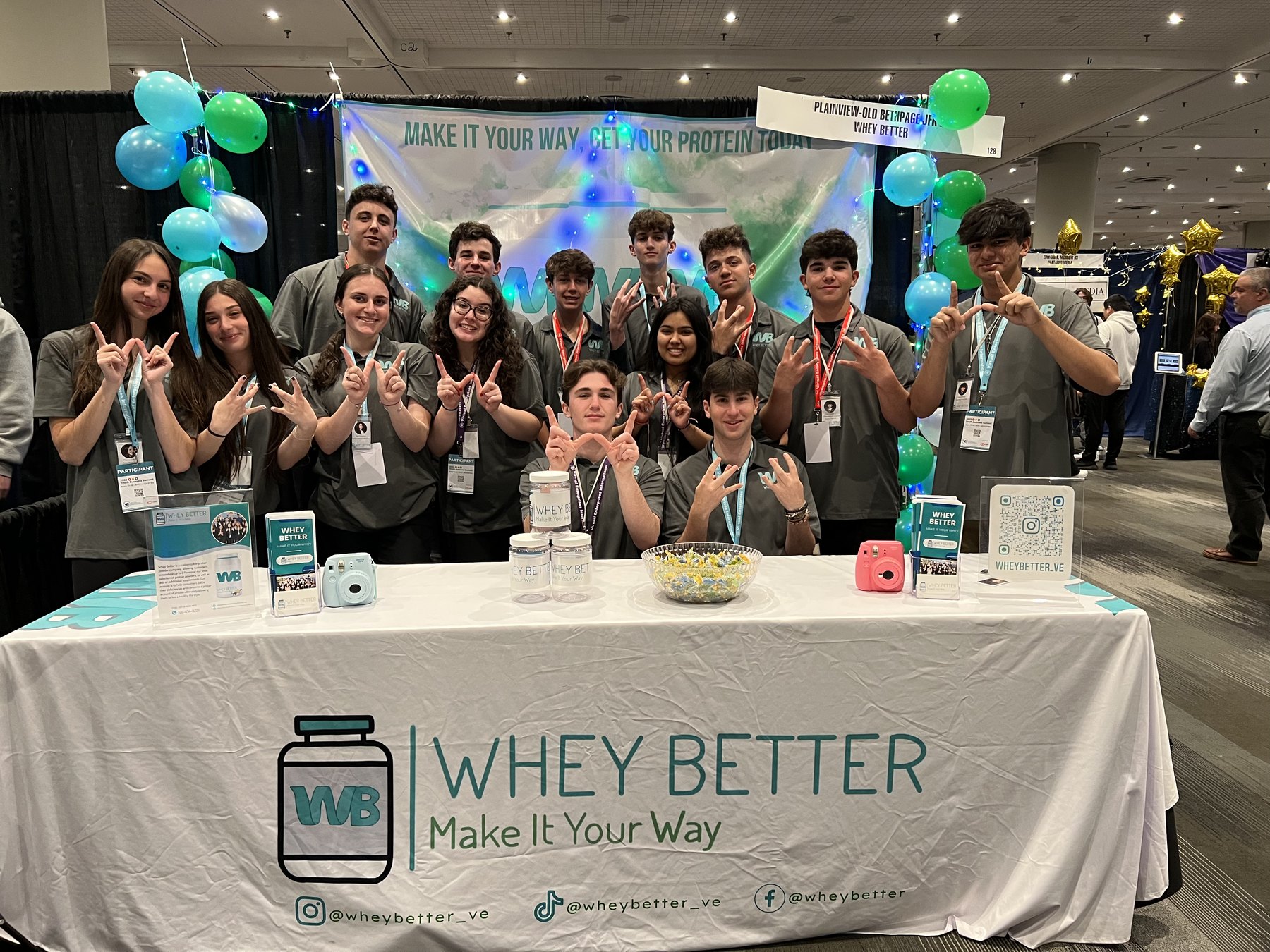 The Whey Better team at their competition booth
